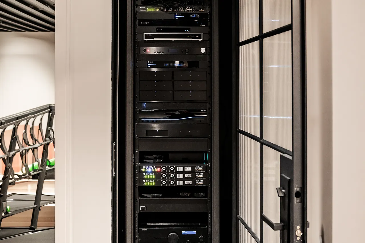 Equipment rack with patch panel, managed switching and video distribution