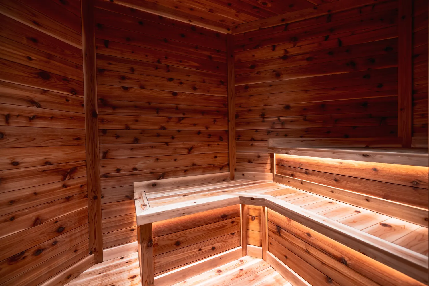 Cedar sauna with concealed LED strip lighting under the benches